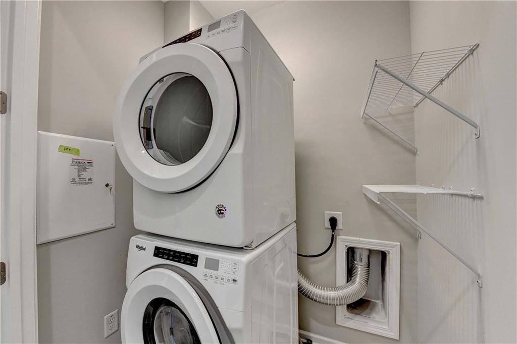 6602 Sterling Drive, Unit 688 Atlanta, GA 30328 - Photo 25 of 34 a utility room with dryer and washer