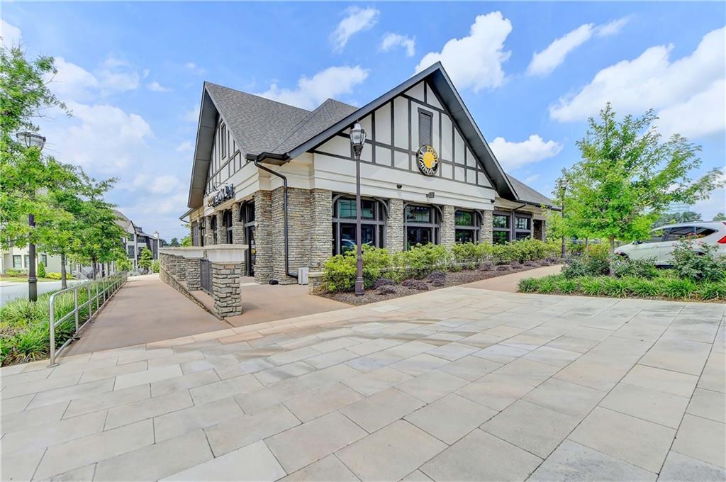 6602 Sterling Drive, Unit 688 Atlanta, GA 30328 - Photo 31 of 34 a view of a house next to a yard