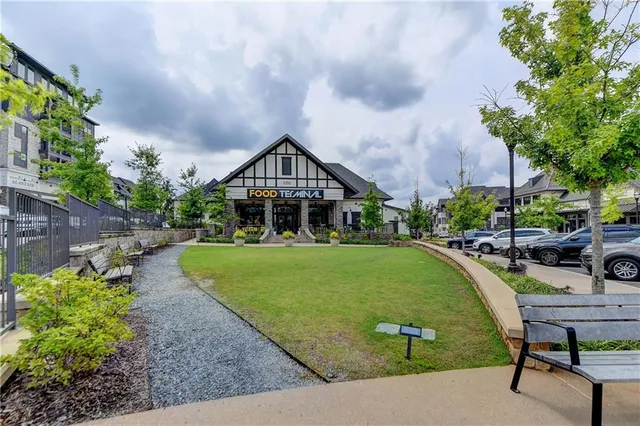 a building with trees in front of it