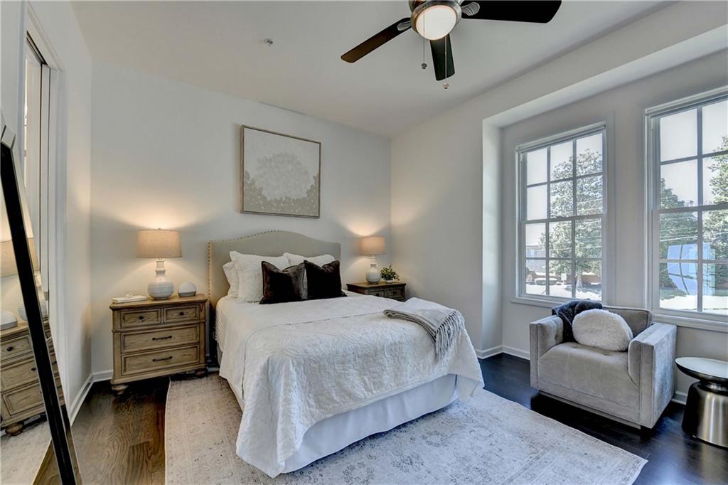 6602 Sterling Drive, Unit 688 Atlanta, GA 30328 - Photo 6 of 34 a bedroom with bed chair and window