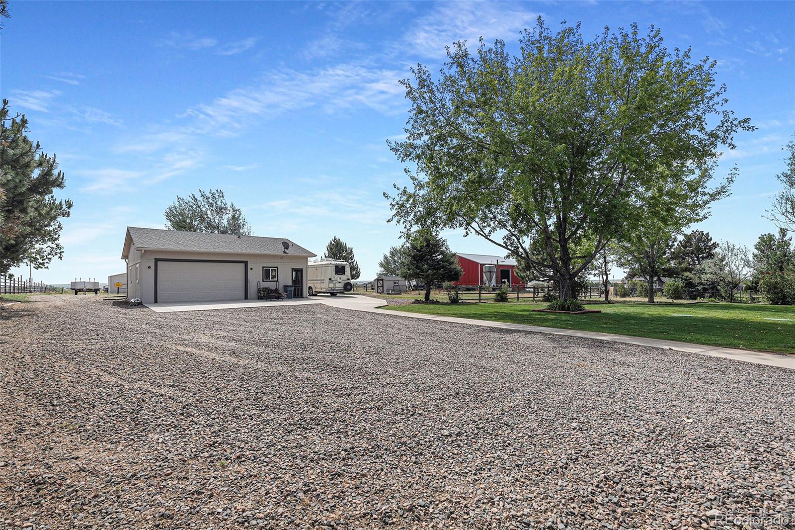 15482 Gadsden Drive Brighton, CO 80603 - Photo 4 of 43 a view of a house with a yard