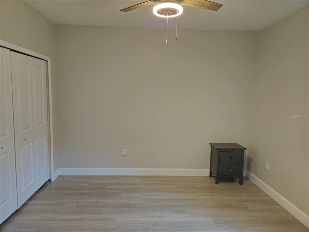 3633 Main Street Sanford, FL 32771 - Photo 11 of 17 a view of a room with an empty space and a window