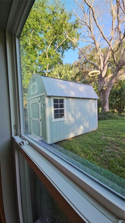 3633 Main Street Sanford, FL 32771 - Photo 15 of 17 a view of a back yard from a window