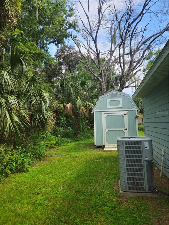 3633 Main Street Sanford, FL 32771 - Photo 16 of 17 a front view of a house with garden