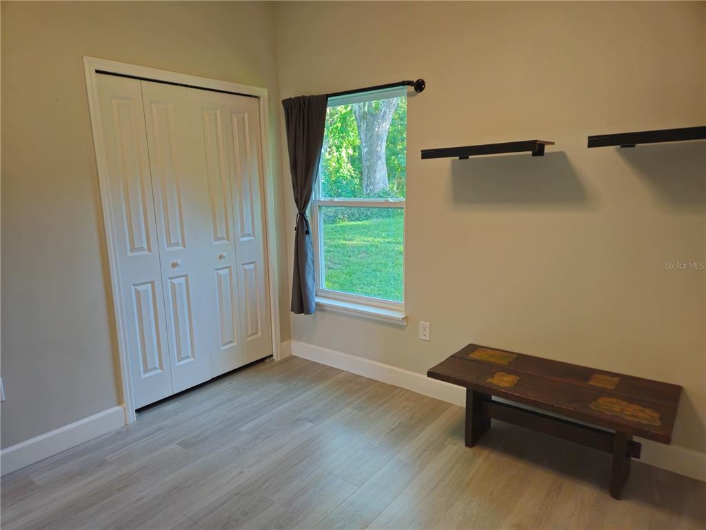 3633 Main Street Sanford, FL 32771 - Photo 8 of 17 a room with window and a wooden door