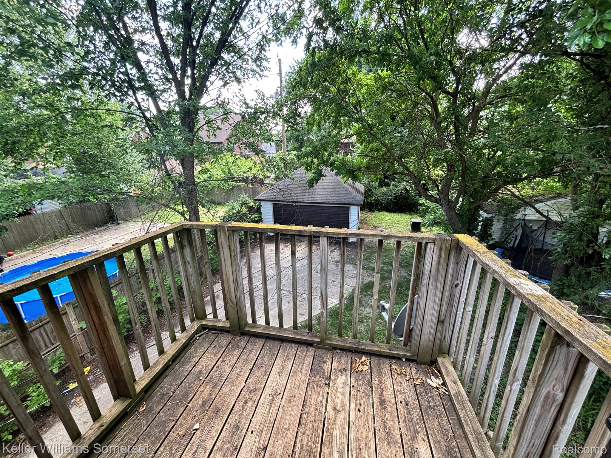 5783 Yorkshire Road Detroit, MI 48224 - Photo 12 of 13 Exterior wood deck with wood railing