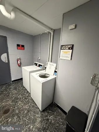 a utility room with a washer and dryer