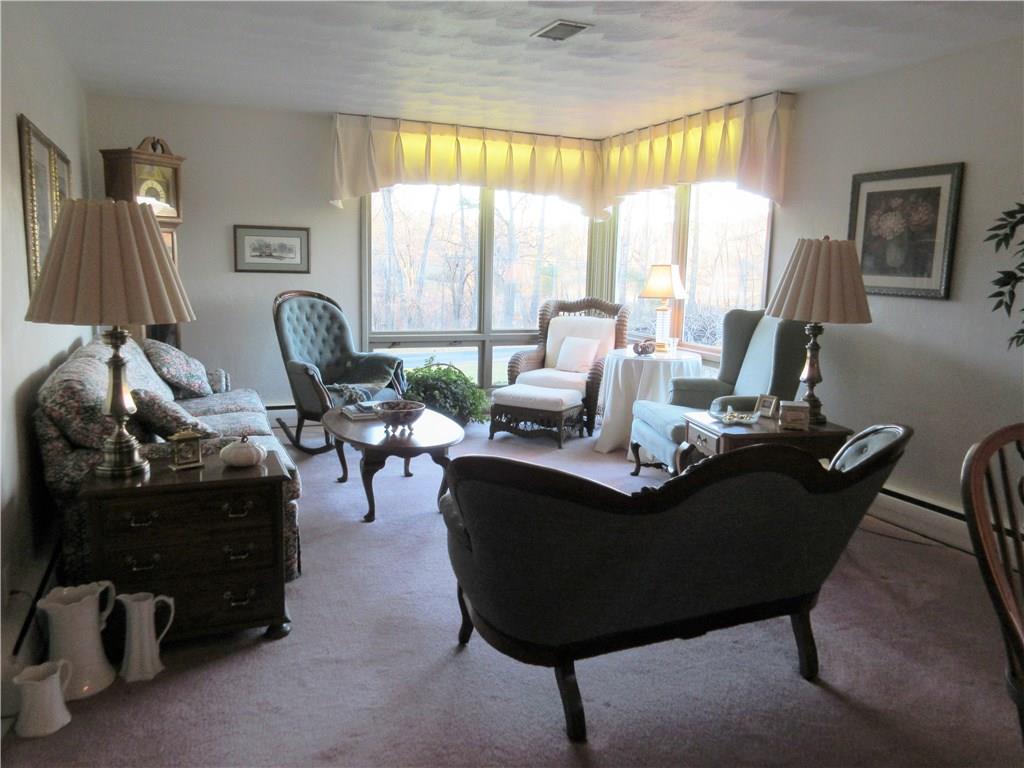 174 Elliott Road Sarver, PA 16055 - Photo 2 of 25 Living room has lots of natural light from the large corner windows.