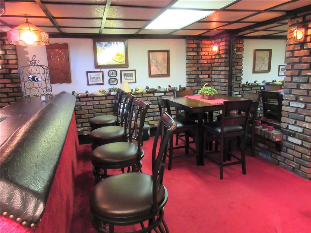 174 Elliott Road Sarver, PA 16055 - Photo 17 of 25 Lots of seating areas on the bar side of the gameroom.