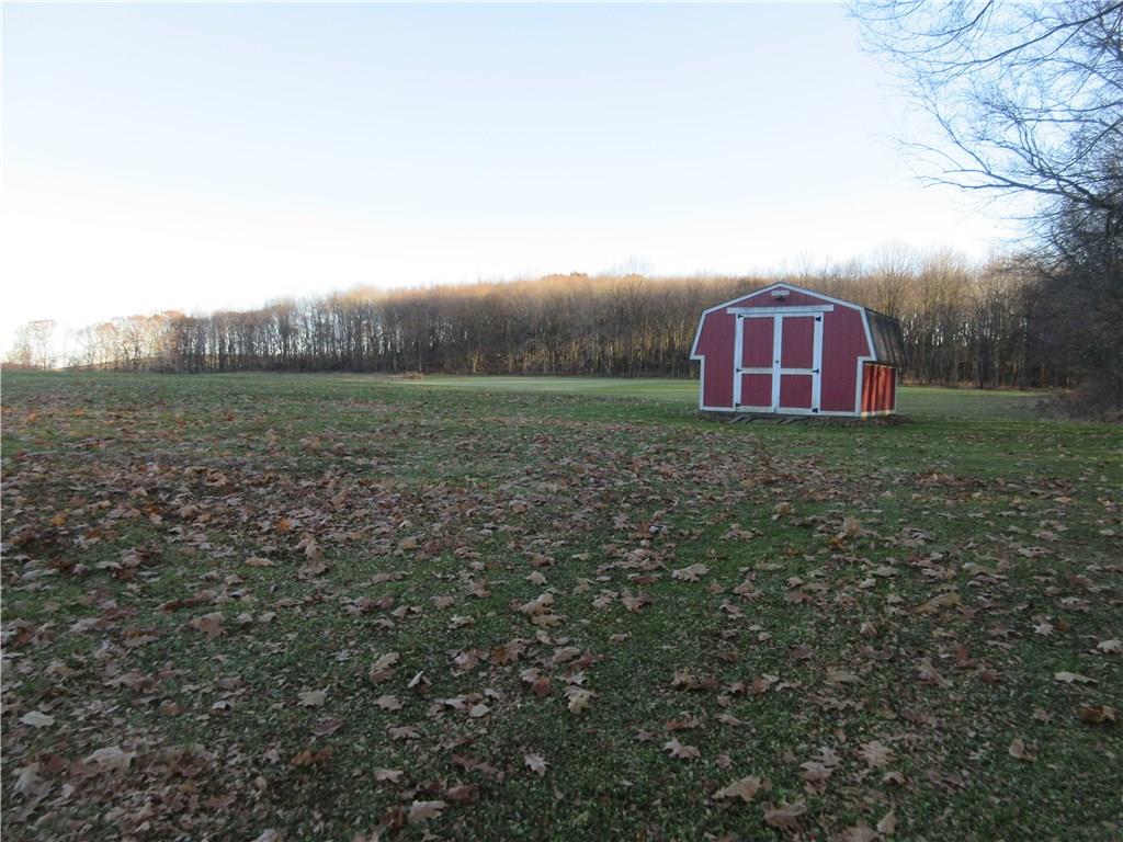 174 Elliott Road Sarver, PA 16055 - Photo 23 of 25 12 x 12 ft shed with a concrete floor, and a view of the lot.