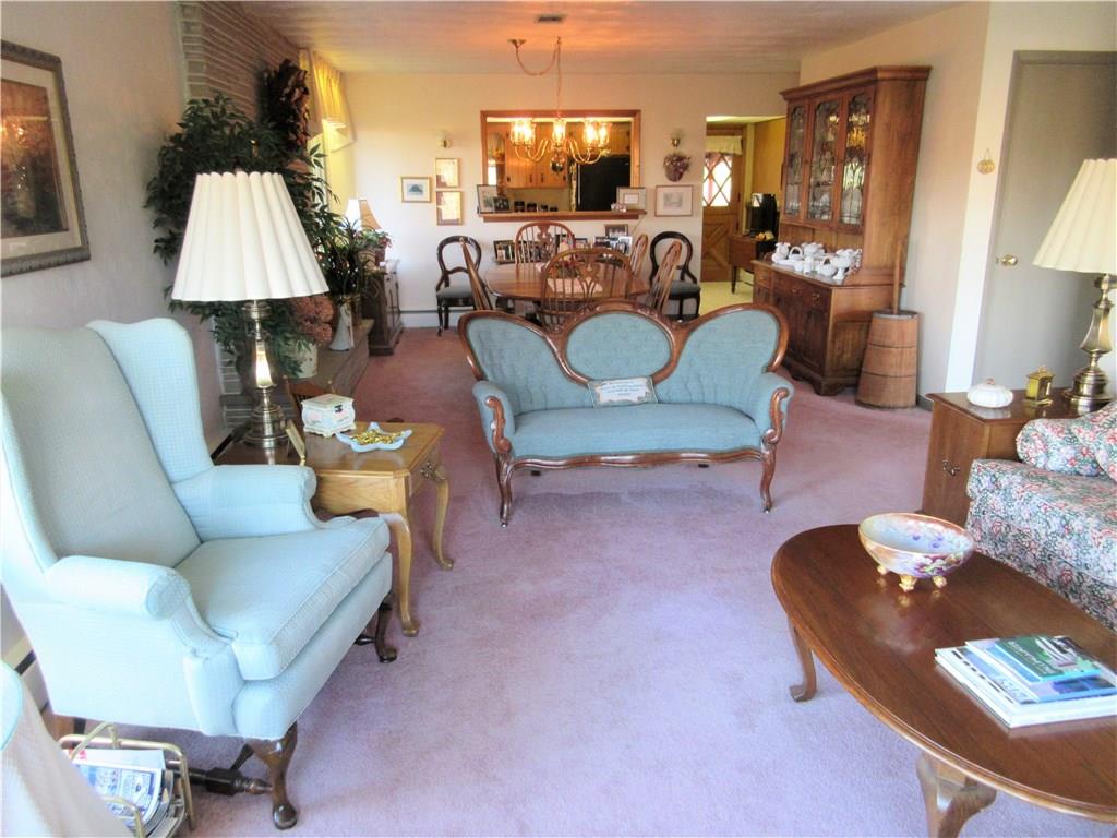 174 Elliott Road Sarver, PA 16055 - Photo 4 of 25 Living room is open to dining room, great for entertaining.