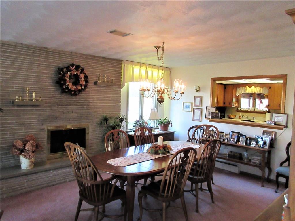174 Elliott Road Sarver, PA 16055 - Photo 6 of 25 Cut stone wood burning fireplace.