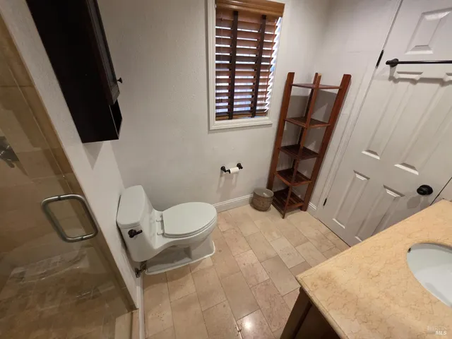 a bathroom with a sink and a toilet