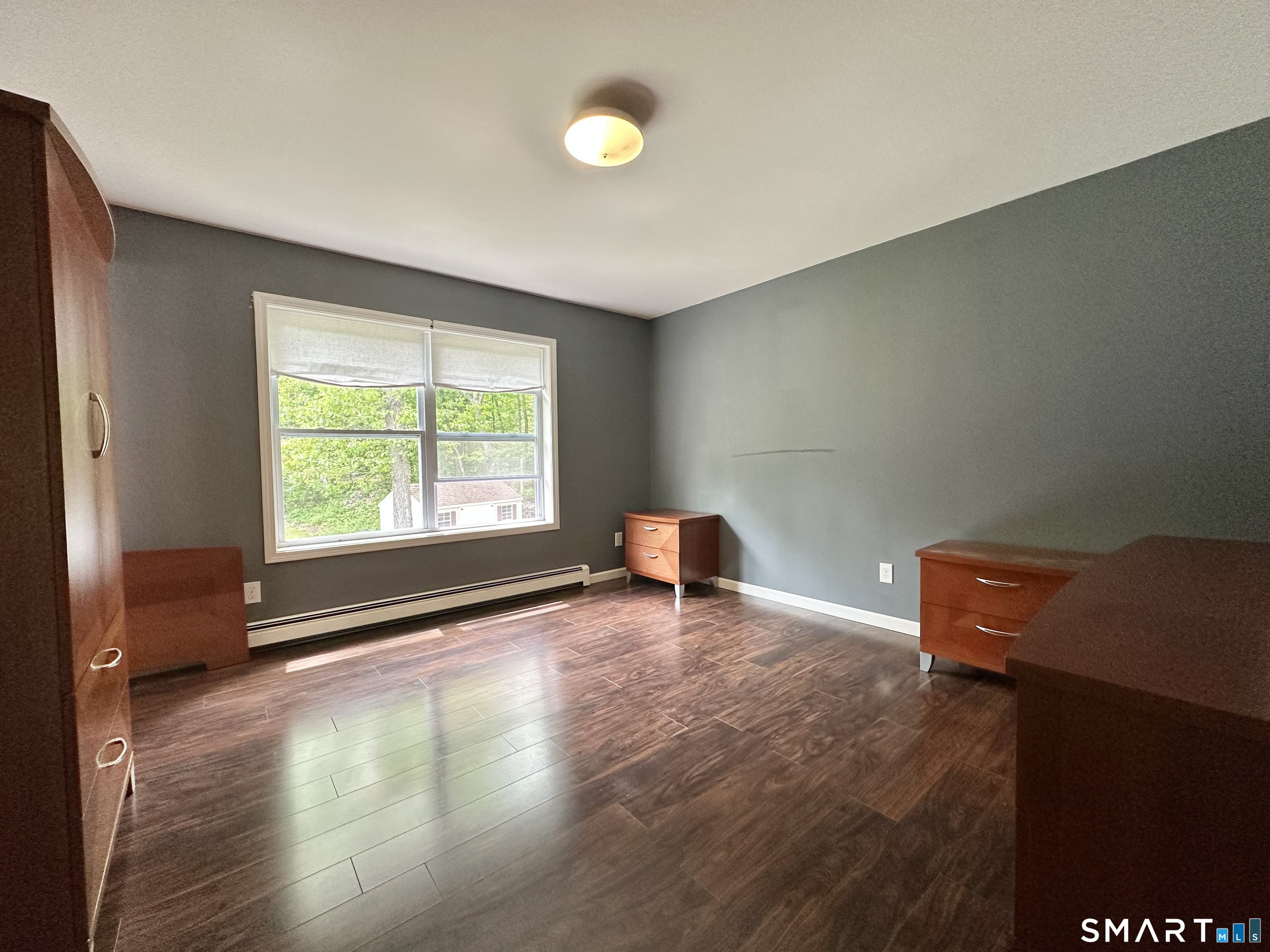 116 Tatnic Hill Road Brooklyn, CT 06234 - Photo 21 of 27 a view of an empty room with a window