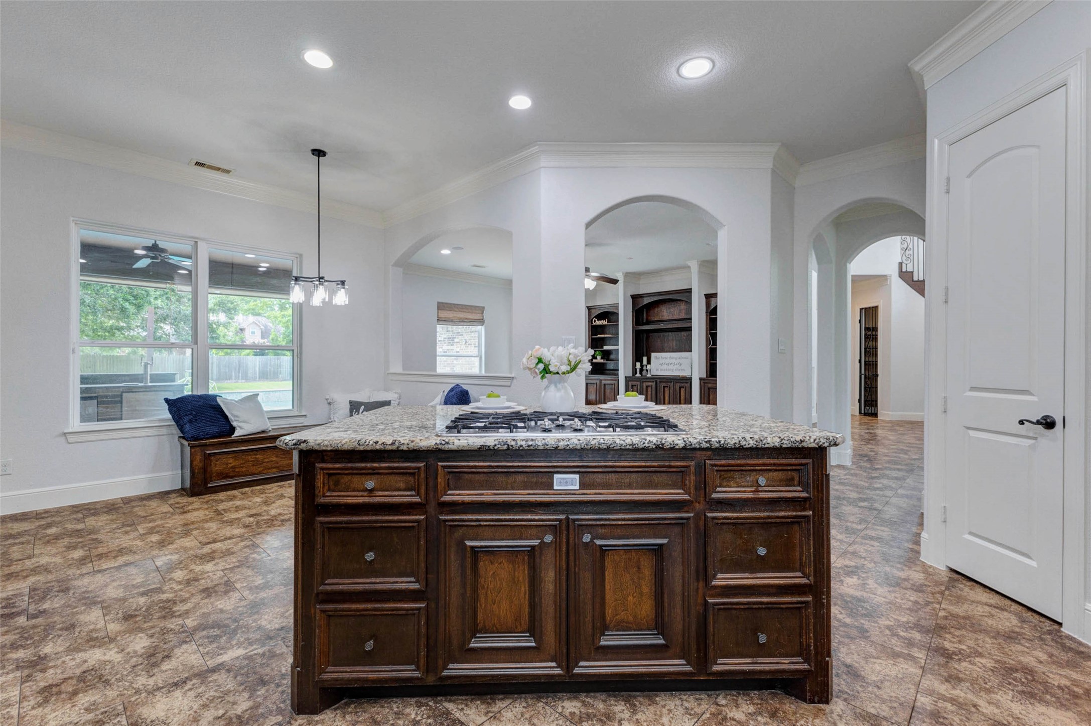 5327 Whitmore Fulshear, TX 77441 - Photo 14 of 50 Open sightlines from the kitchen allow the chef to remain connected while preparing meals, creating the ideal setting for entertaining.
