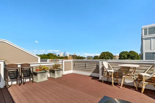 a view of roof deck with patio