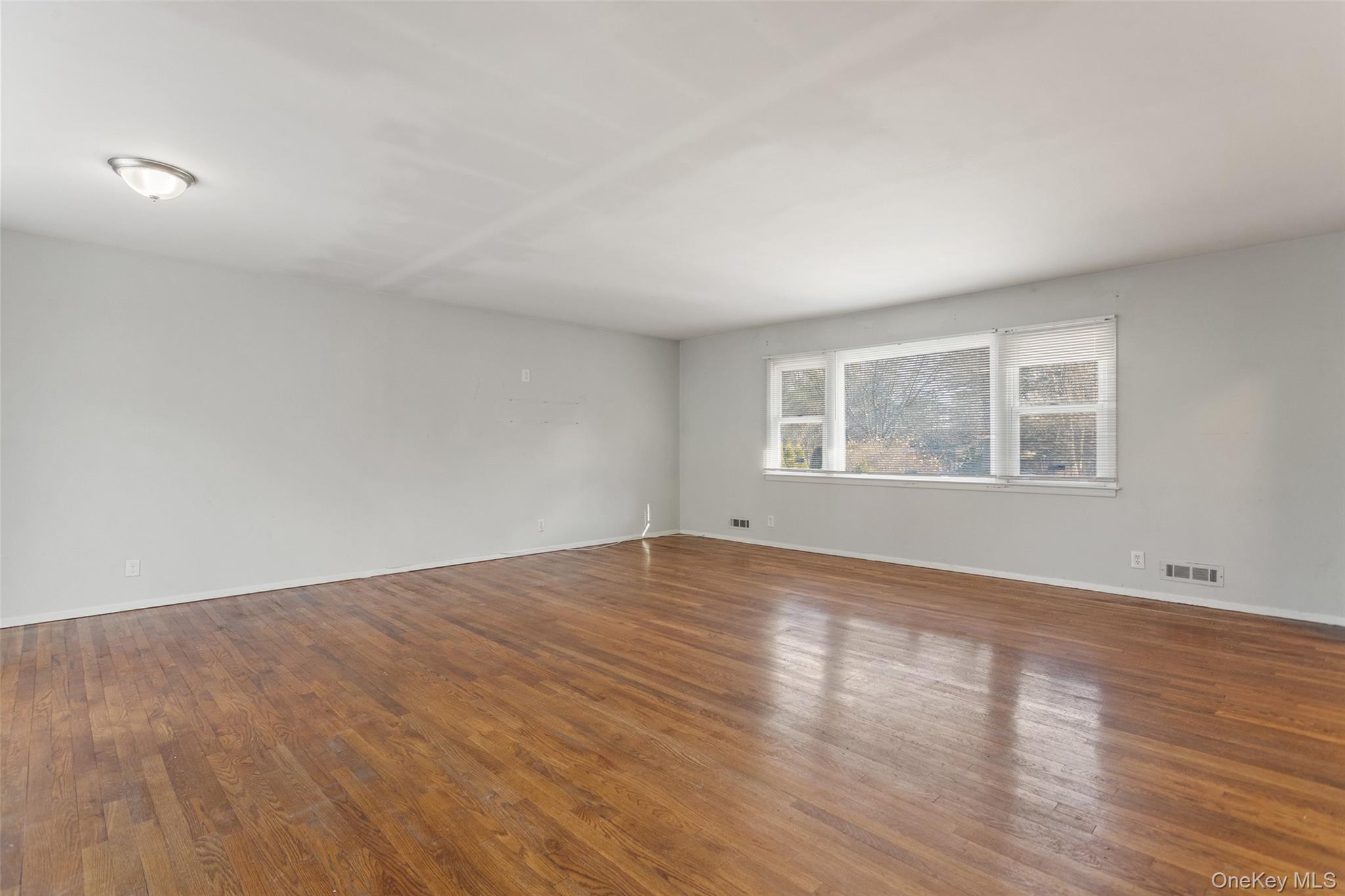 11 Muir Place New Rochelle, NY 10801 - Photo 11 of 30 Living Room from the Kitchen