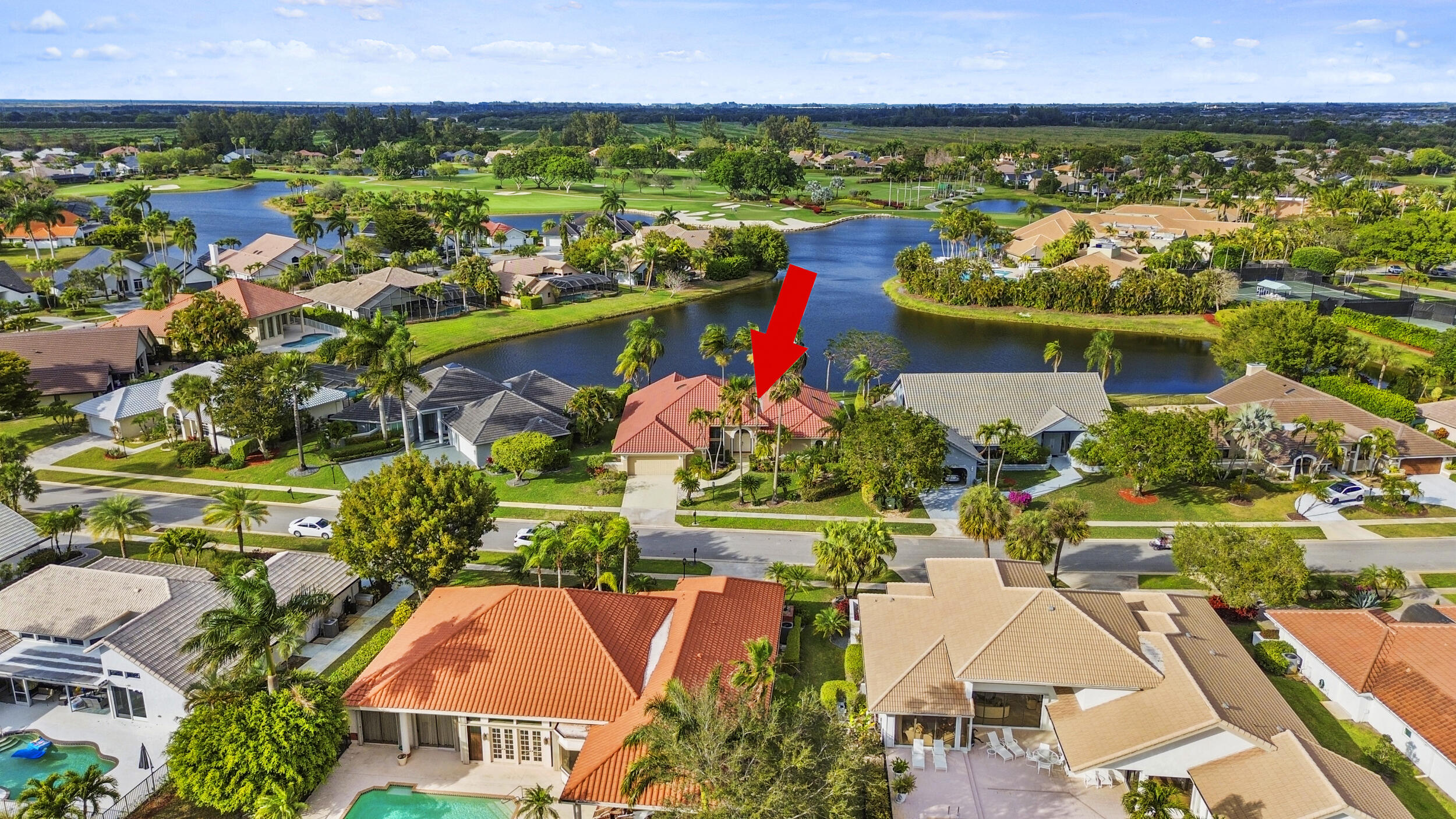 10747 Stonebridge Boulevard Boca Raton, FL 33498 - Photo 53 of 75 an aerial view of residential houses with outdoor space and swimming pool