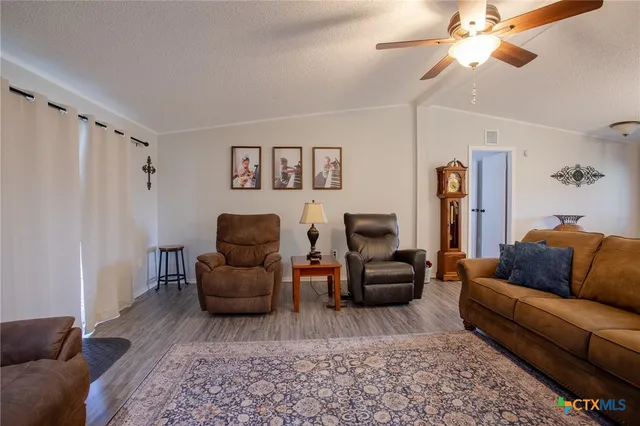 a living room with furniture and a couch