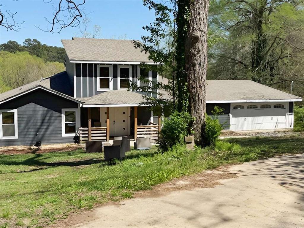 a house view with a garden space