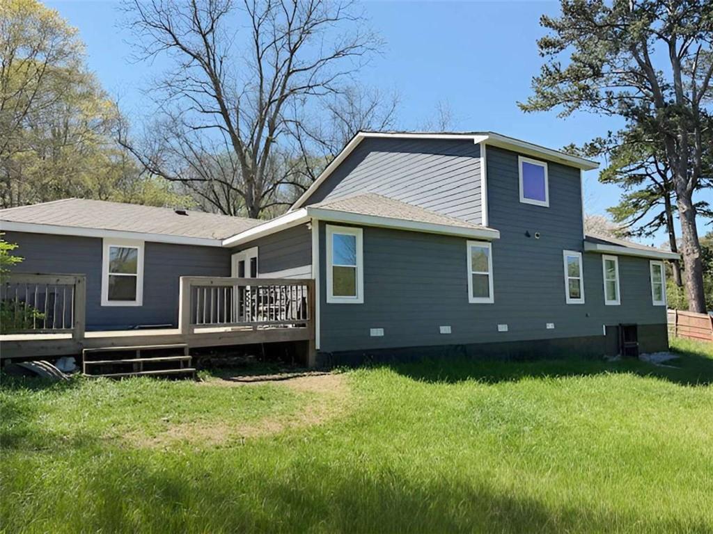 6230 Feldwood Road South Fulton, GA 30349 - Photo 2 of 4 a house view with a garden space