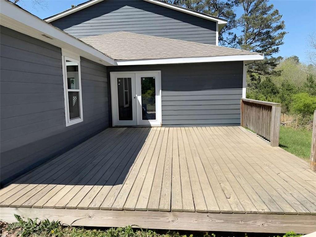 6230 Feldwood Road South Fulton, GA 30349 - Photo 3 of 4 a view of backyard with wooden floor and fence