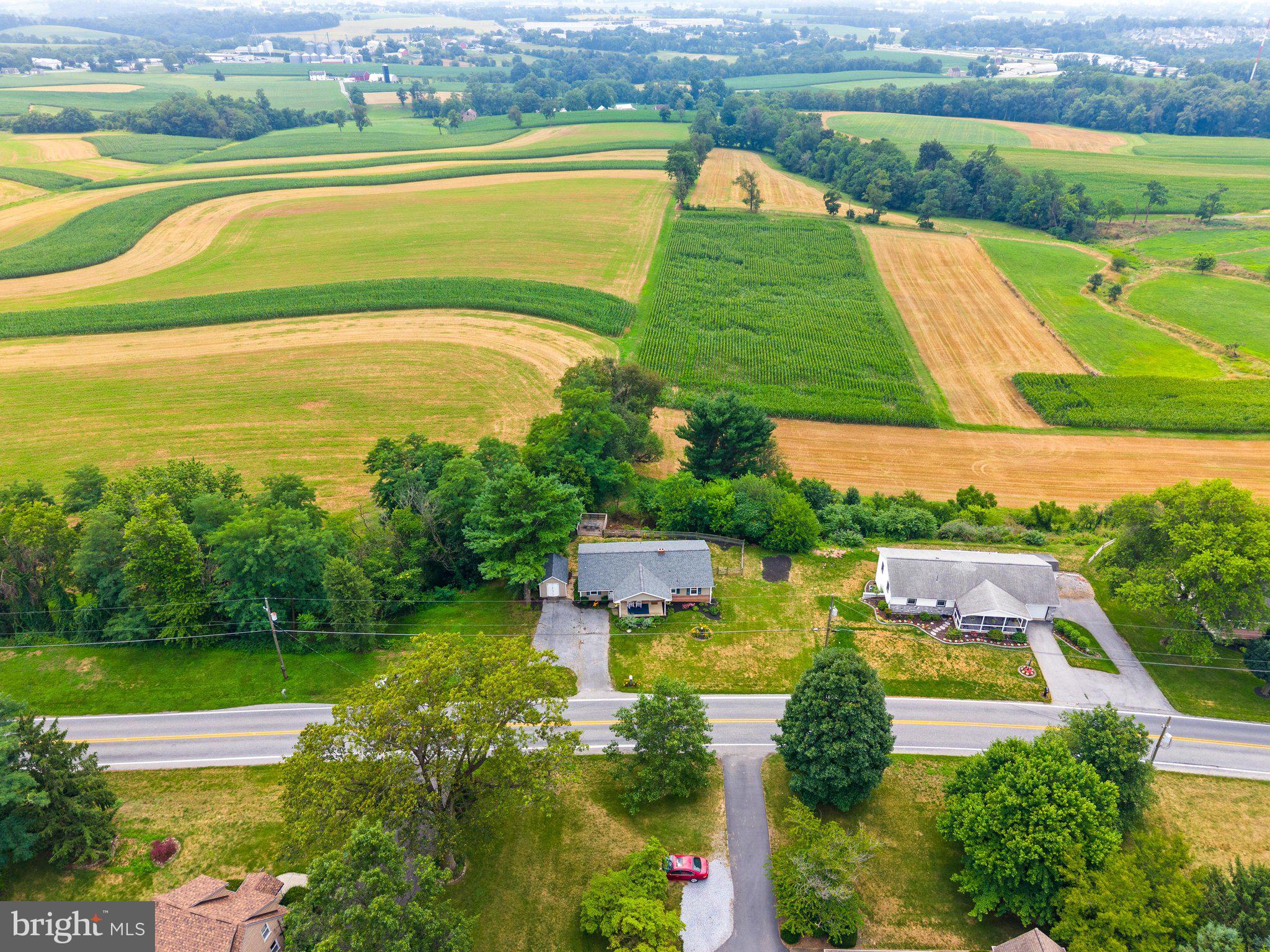 1562 Ridge Road Elizabethtown, PA 17022 - Photo 41 of 41 an aerial view of a house with a garden and lake view