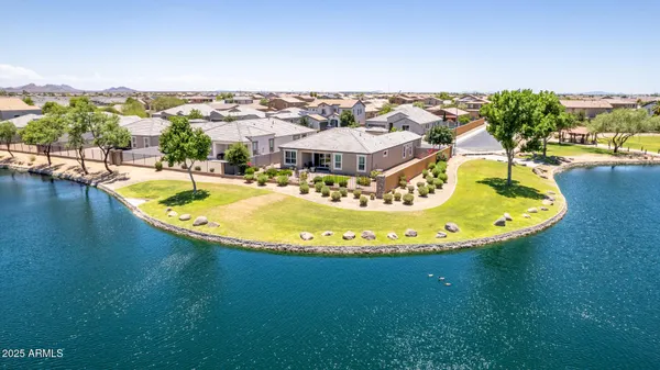 a view of a swimming pool with a lake view