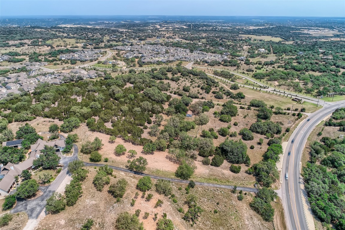 16316 Hamilton Pool Road Austin, TX 78738 - Photo 13 of 17 an aerial view of a houses with a yard