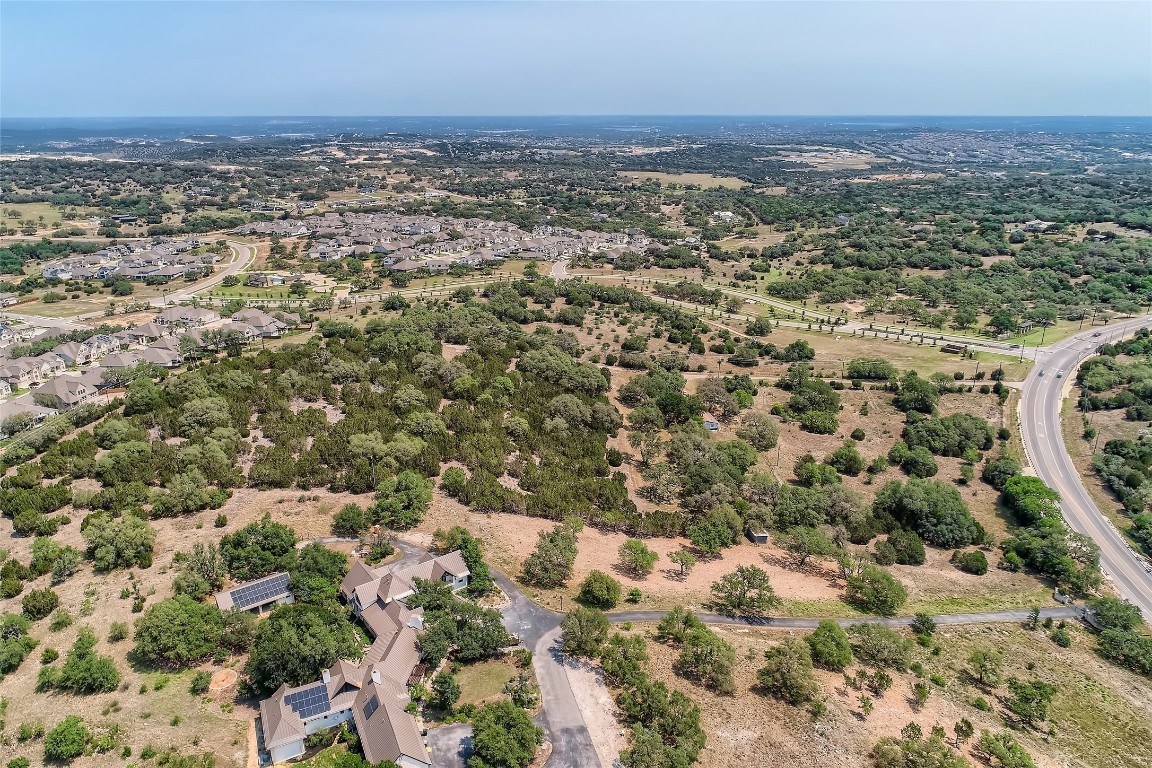 16316 Hamilton Pool Road Austin, TX 78738 - Photo 14 of 17 an aerial view of residential houses with outdoor space