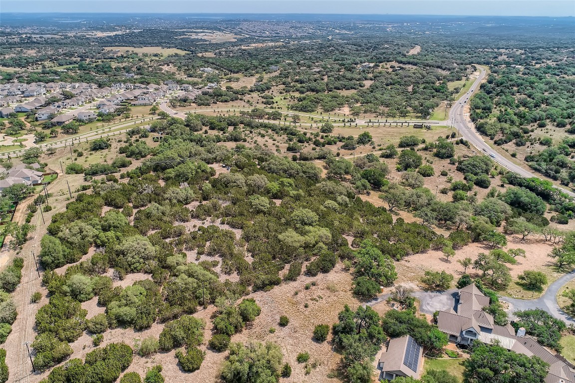 16316 Hamilton Pool Road Austin, TX 78738 - Photo 15 of 17 an aerial view of a houses