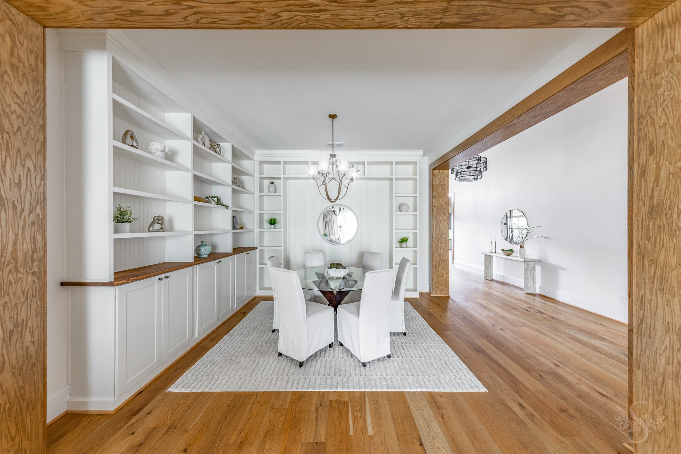 27919 Indigo Ridge Drive Fulshear, TX 77441 - Photo 12 of 50 a living room with wooden floor furniture and a rug
