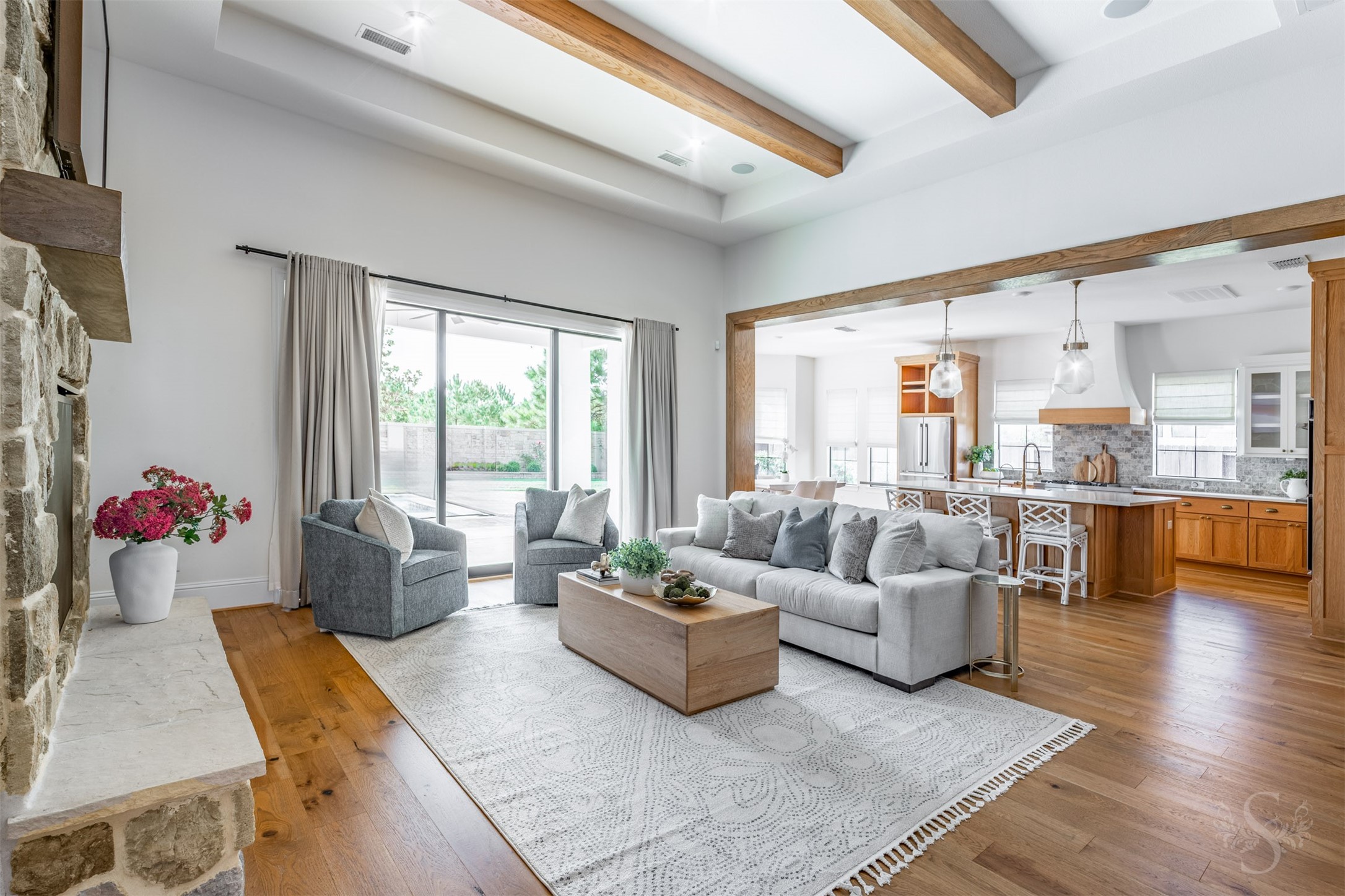 27919 Indigo Ridge Drive Fulshear, TX 77441 - Photo 15 of 50 a living room with furniture and floor to ceiling windows