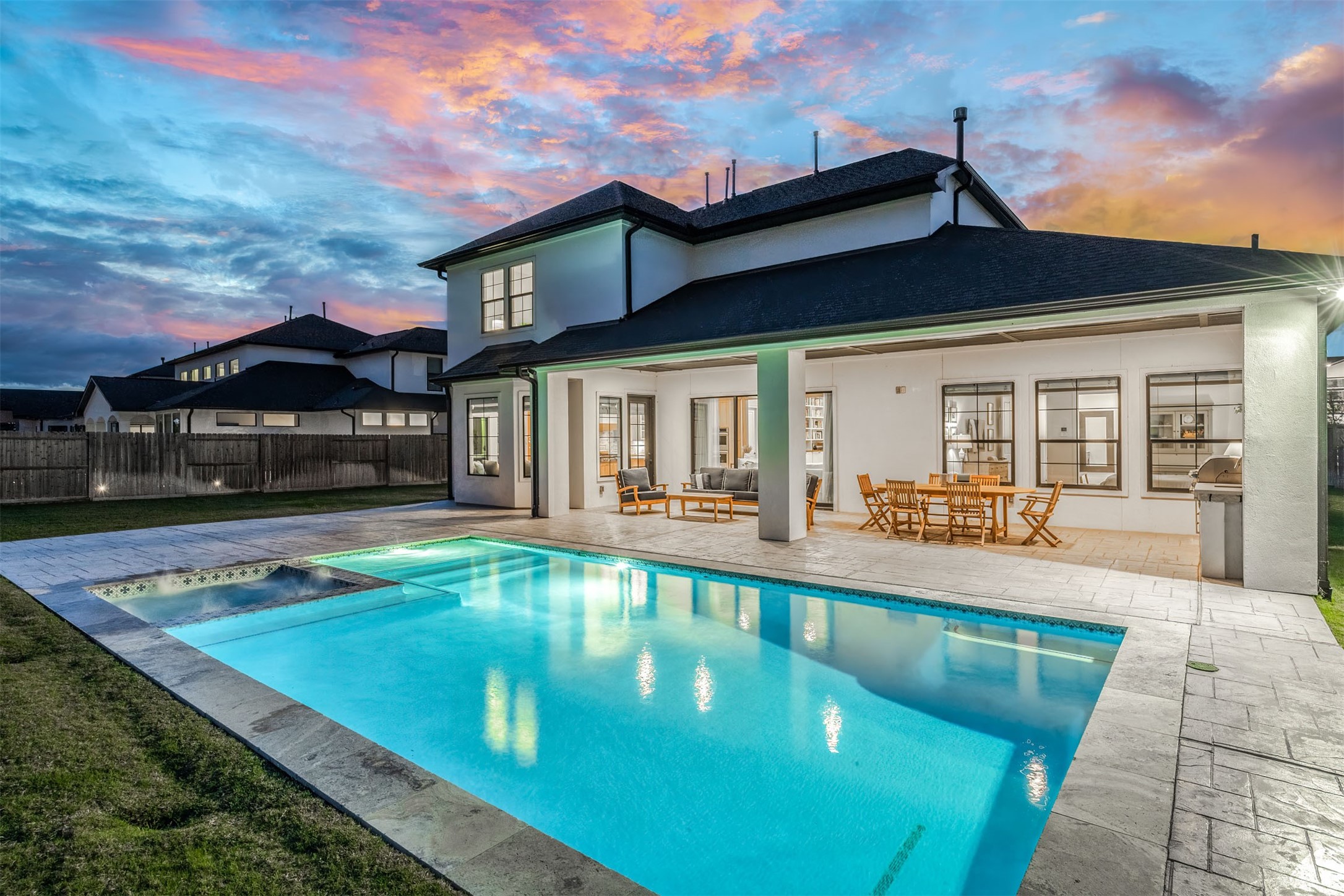 27919 Indigo Ridge Drive Fulshear, TX 77441 - Photo 2 of 50 a view of a house with swimming pool and sitting area