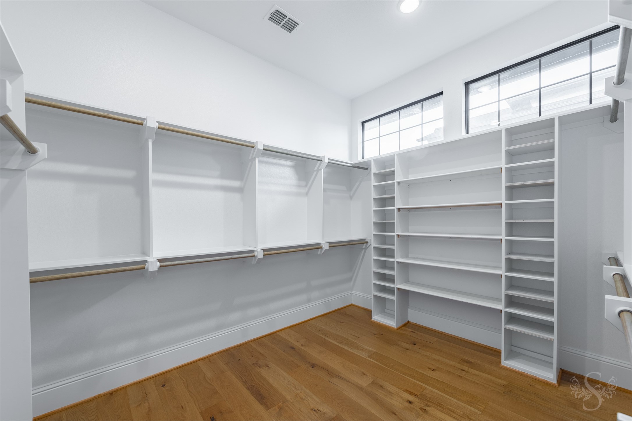 27919 Indigo Ridge Drive Fulshear, TX 77441 - Photo 30 of 50 a view of walk in closet with empty racks
