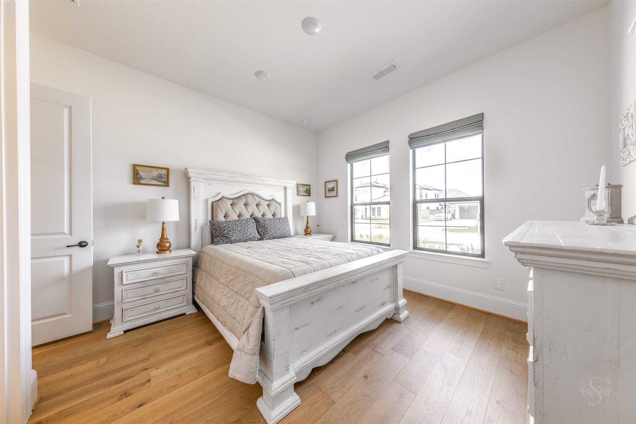 27919 Indigo Ridge Drive Fulshear, TX 77441 - Photo 31 of 50 a bedroom with a bed and a window