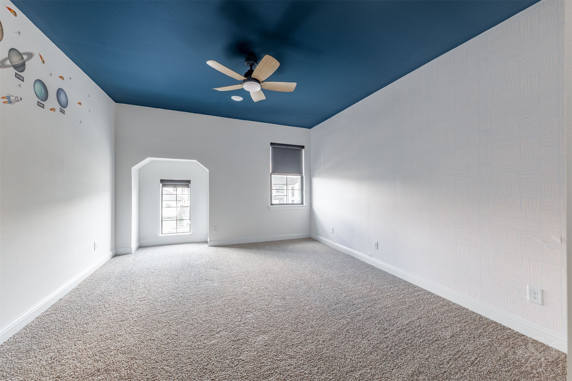 27919 Indigo Ridge Drive Fulshear, TX 77441 - Photo 40 of 50 a view of a livingroom with a ceiling fan and window