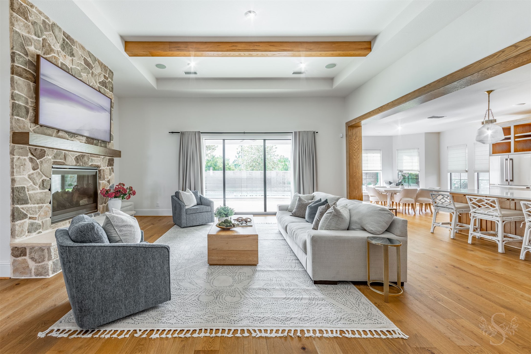 27919 Indigo Ridge Drive Fulshear, TX 77441 - Photo 4 of 50 a living room with fireplace furniture and a large window