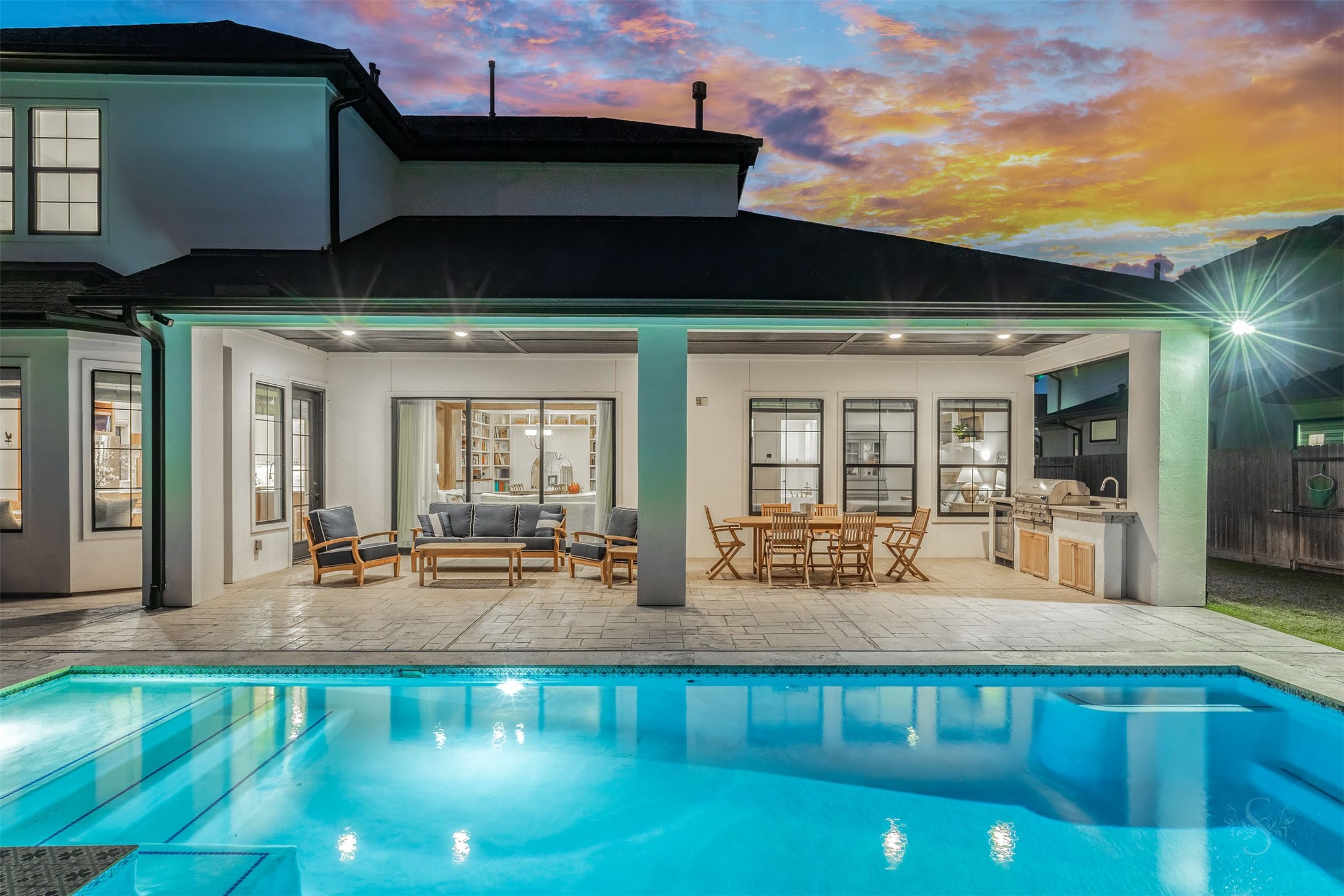 27919 Indigo Ridge Drive Fulshear, TX 77441 - Photo 6 of 50 a view of a house with swimming pool and sitting area