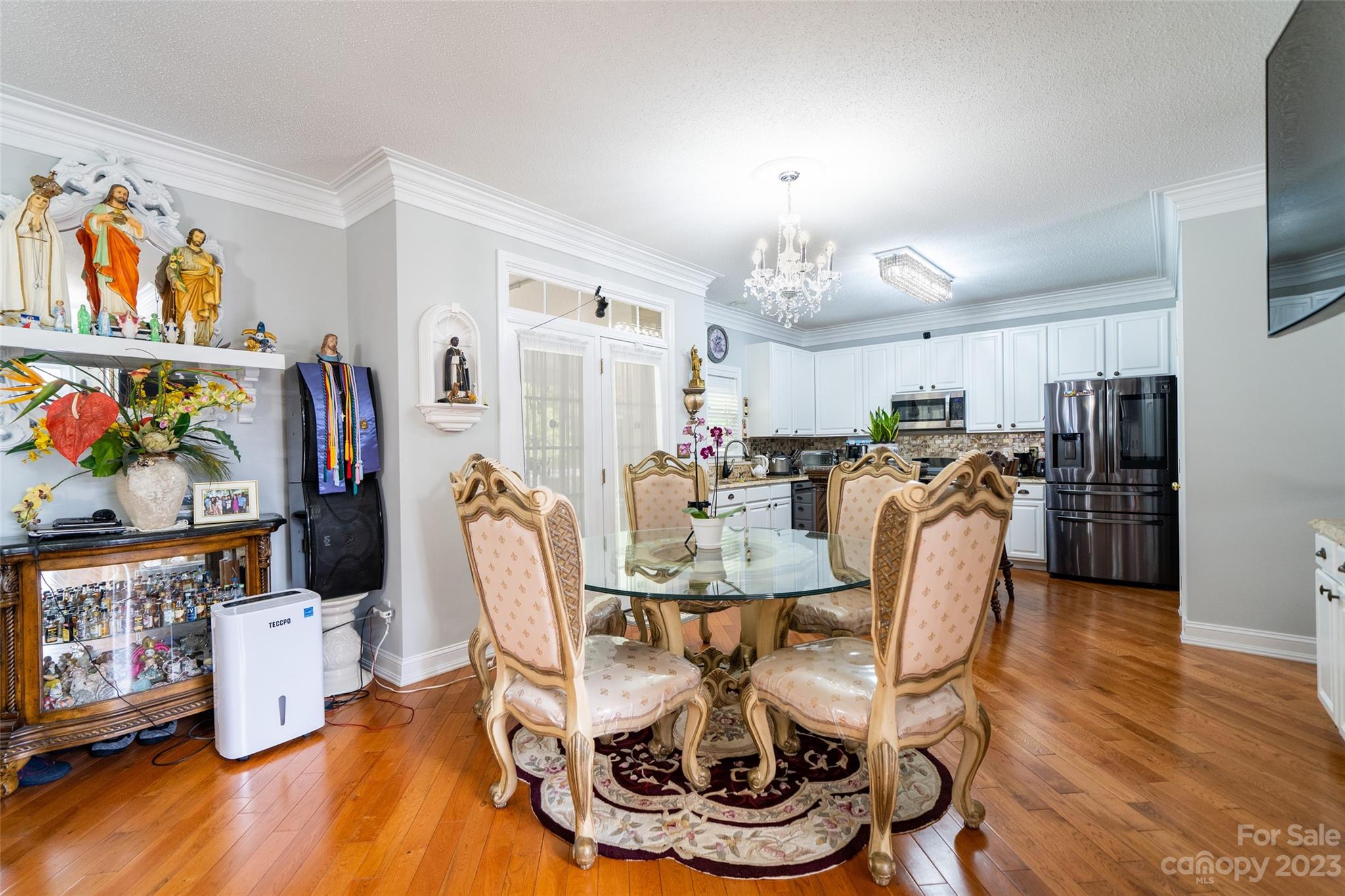 67 Walnut Crest Road Fletcher, NC 28732 - Photo 12 of 36 a view of a dining room with furniture wooden floor and a kitchen