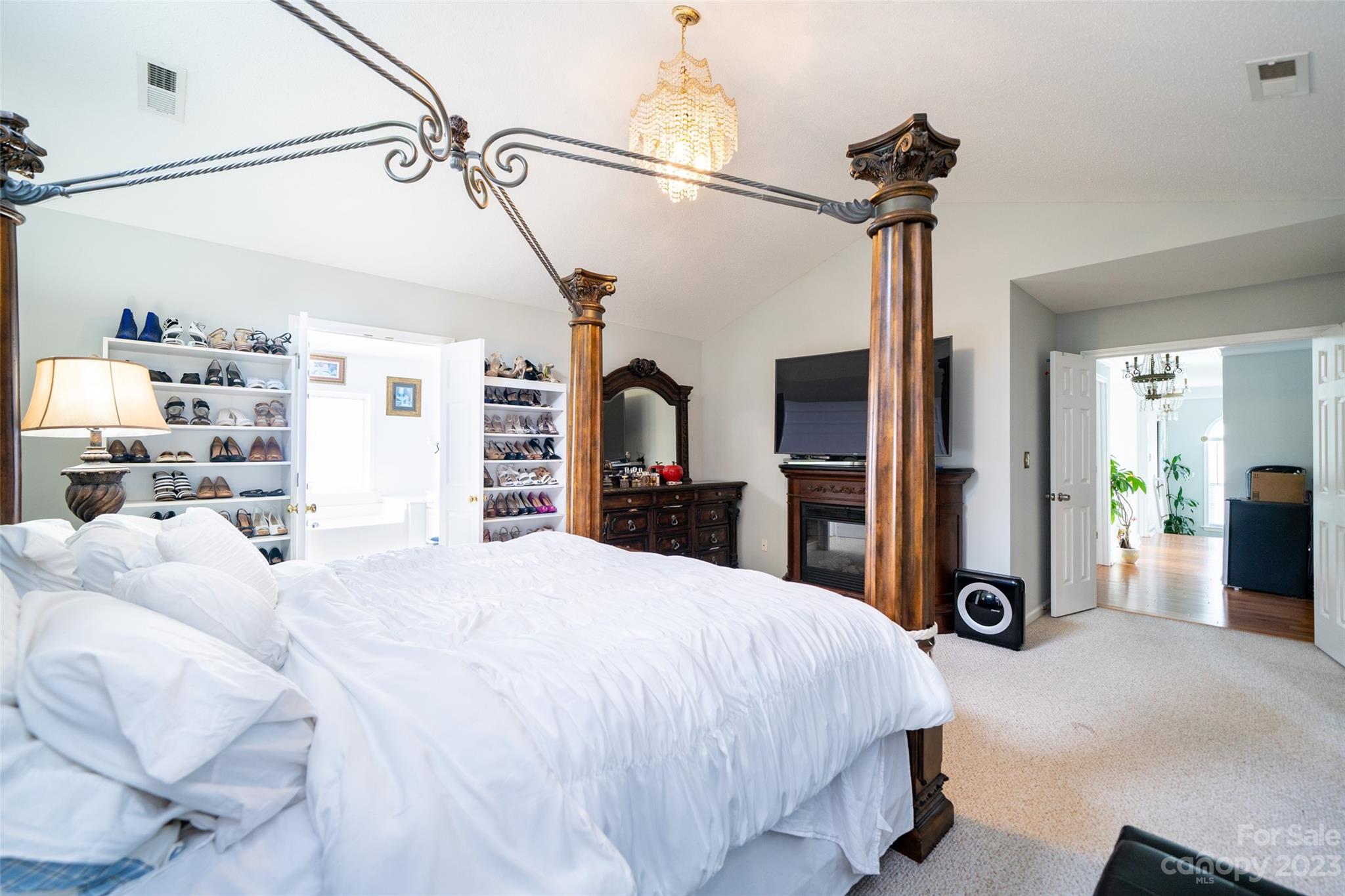 67 Walnut Crest Road Fletcher, NC 28732 - Photo 17 of 36 a bed room with a bed and a view of kitchen