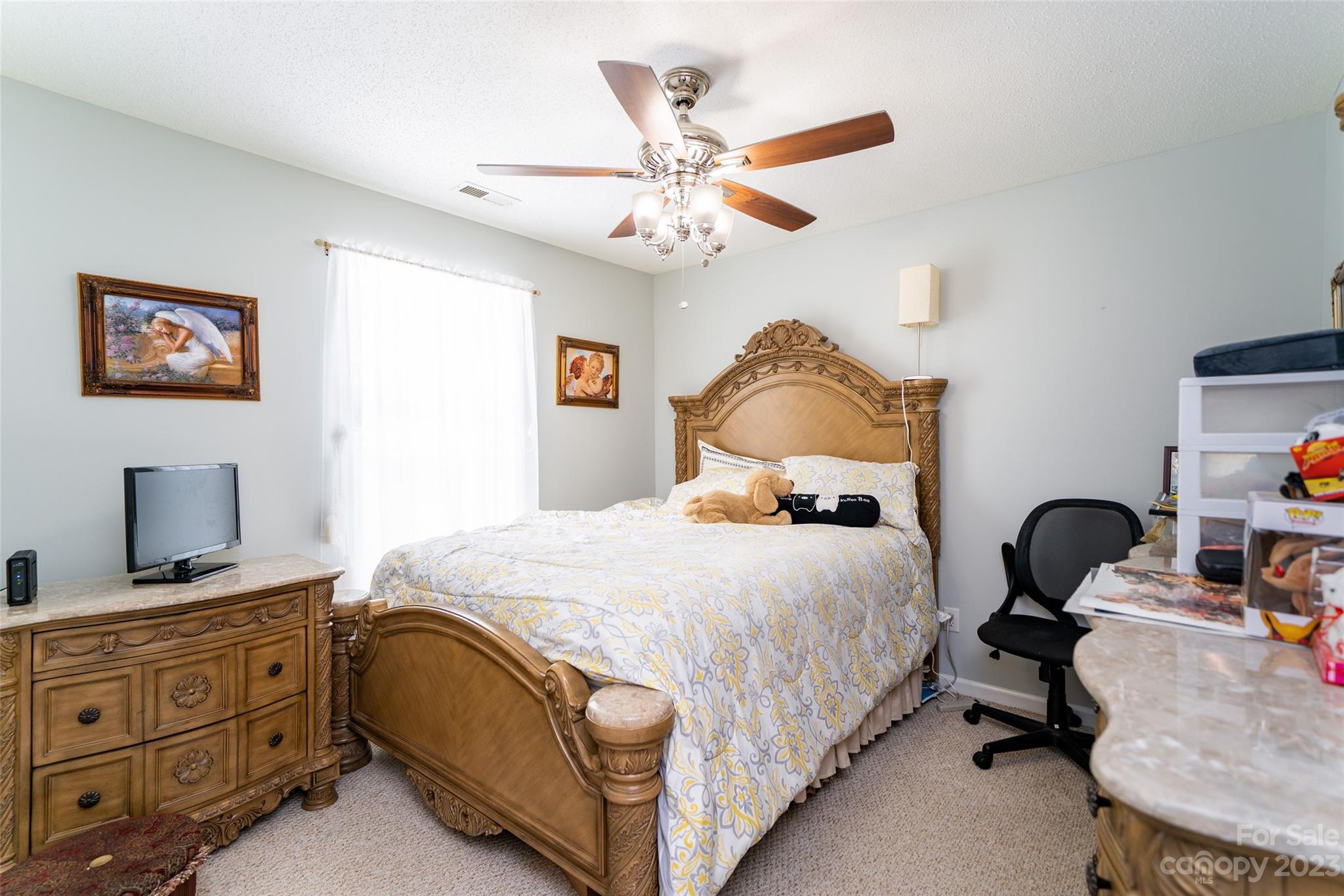 67 Walnut Crest Road Fletcher, NC 28732 - Photo 23 of 36 a bedroom with bed and window