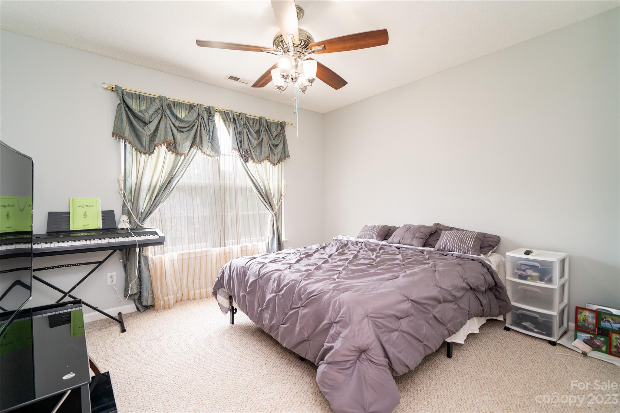 67 Walnut Crest Road Fletcher, NC 28732 - Photo 24 of 36 a bedroom with a bed and a window