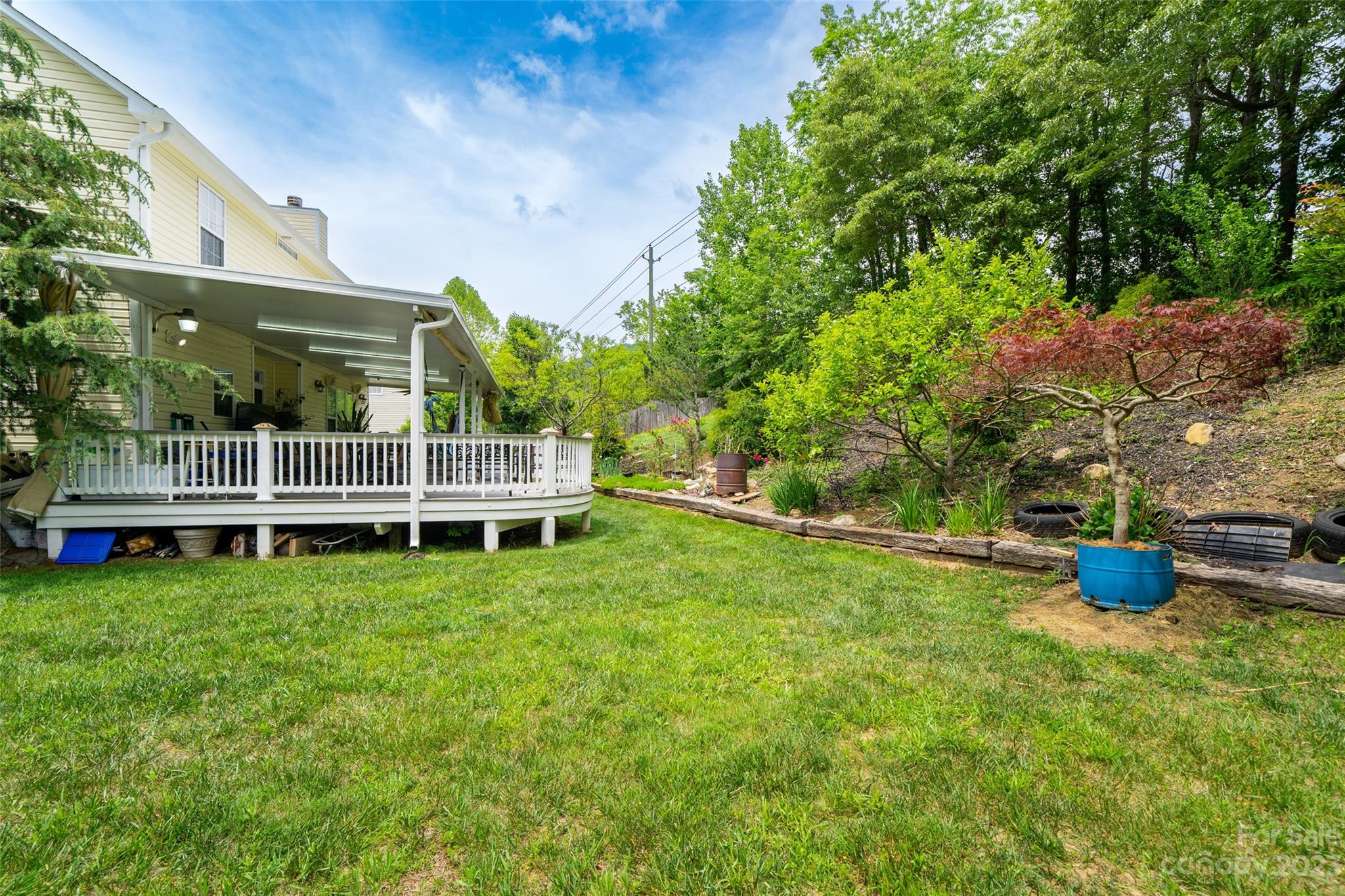 67 Walnut Crest Road Fletcher, NC 28732 - Photo 29 of 36 a view of a house with backyard and sitting area