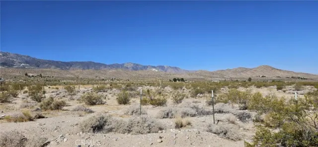 a view of mountain view with mountains in the background