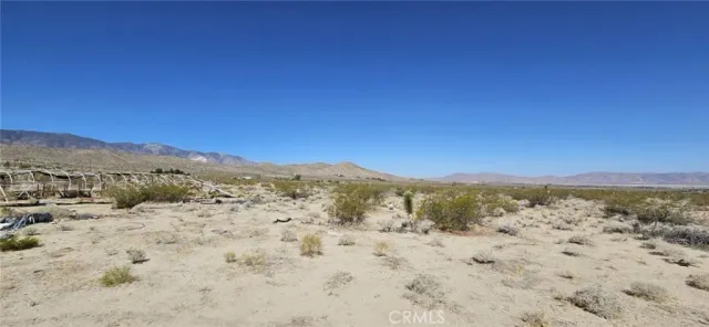 a view of mountain view with mountains in the background