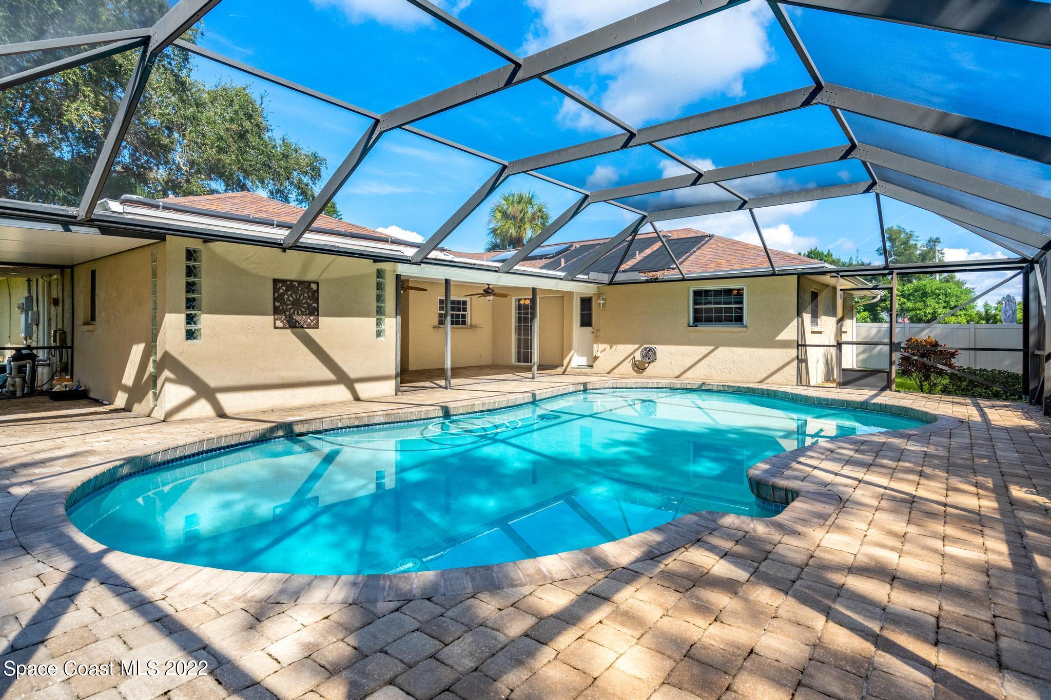 3770 Laurette Road Merritt Island, FL 32952 - Photo 36 of 57 Screened in Pool with Pavers