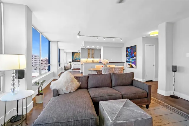 a living room with furniture and a couch