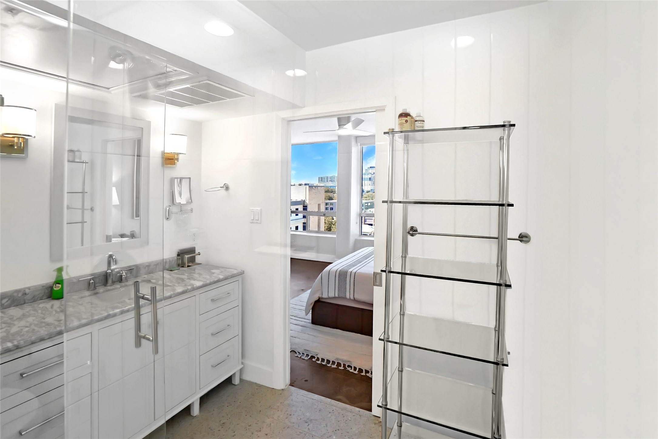 1212 Guadalupe Street, Unit 1004 Austin, TX 78701 - Photo 24 of 33 a bathroom with a double vanity sink and mirror