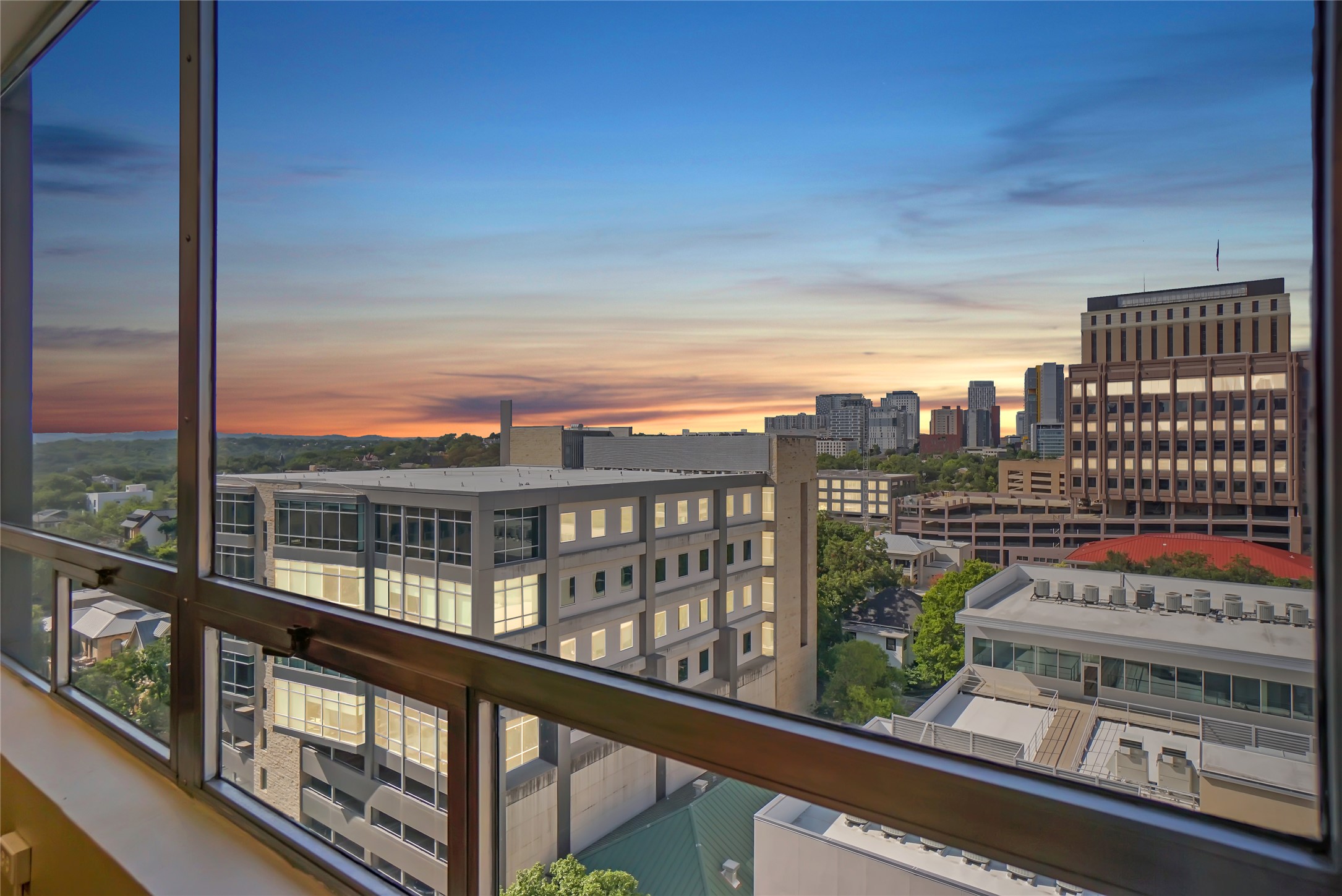 1212 Guadalupe Street, Unit 1004 Austin, TX 78701 - Photo 3 of 33 a view of a city from a balcony